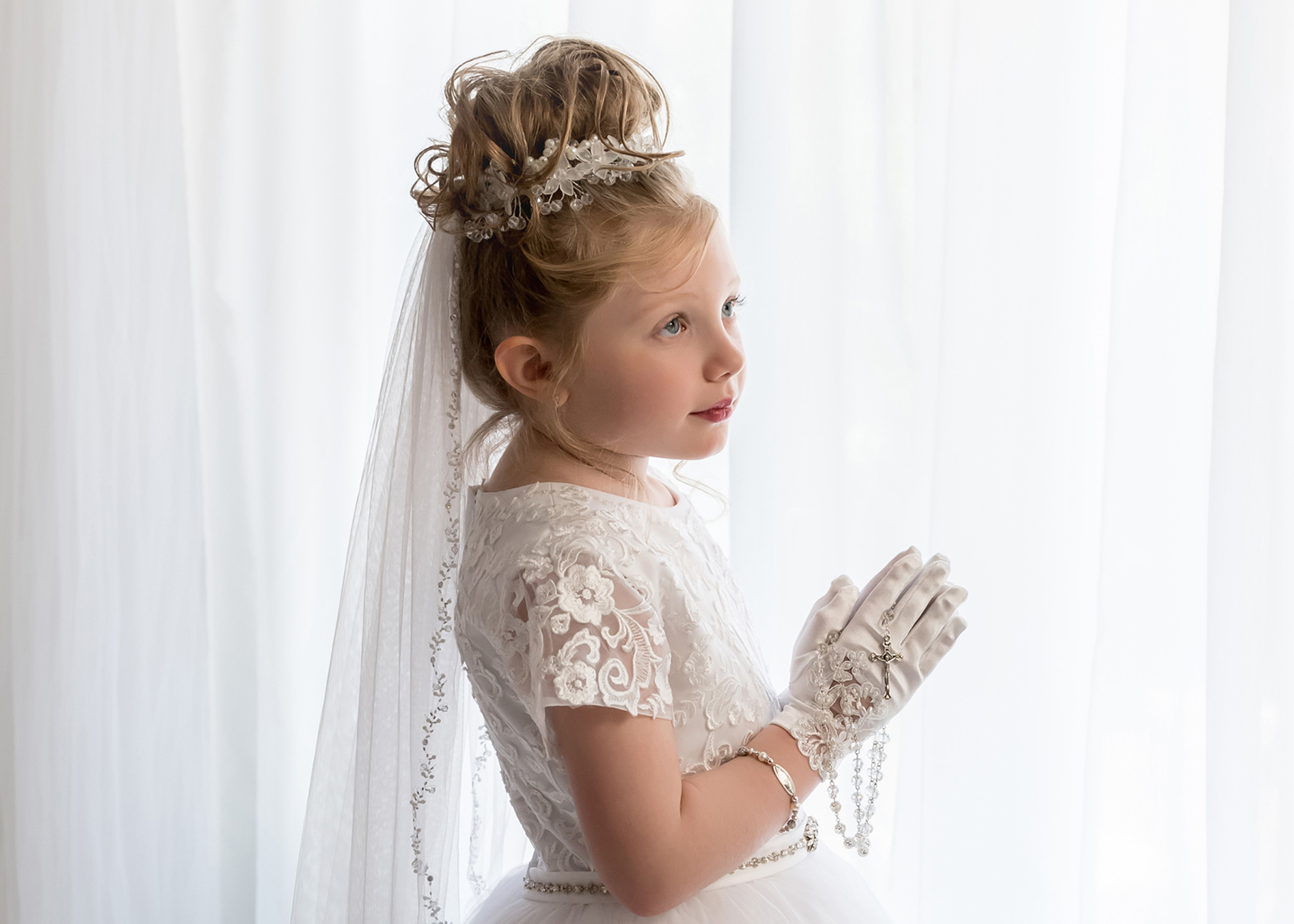 A child's First Communion picture in Marlton, New Jersey Studio by Mary Quinn Photography.