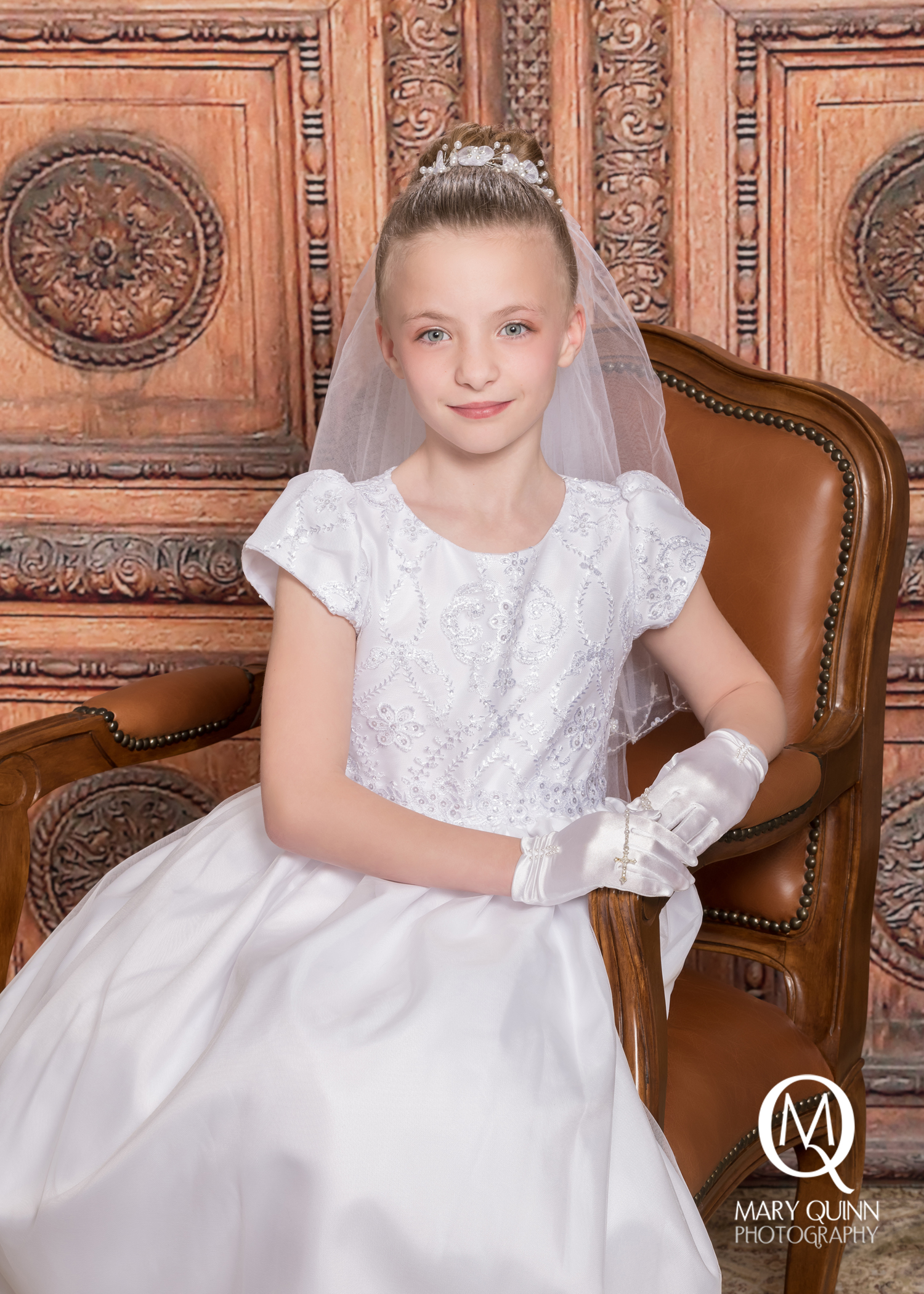 First Holy Communion girl with a classic backdrop in South Jersey by Mary Quinn.